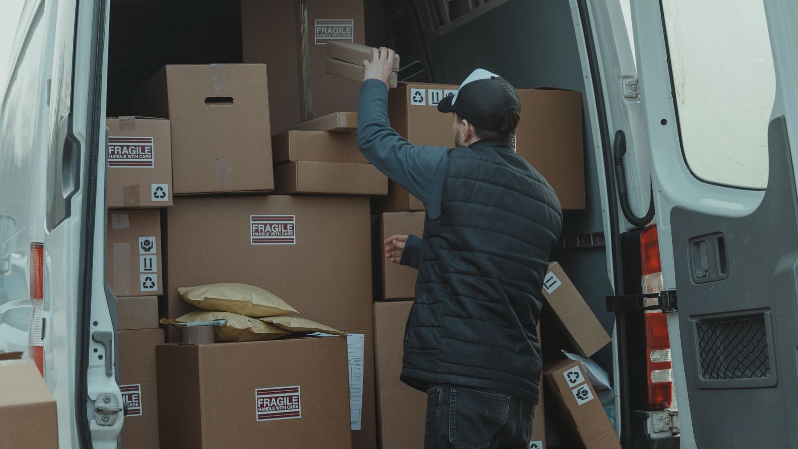 Boxes being organised inside a van