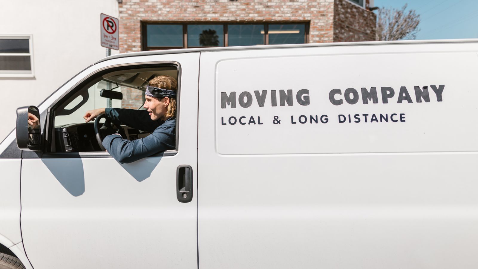 Driver at the wheel of a large van